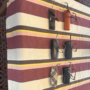 Various prescription eyeglasses.   As is